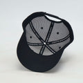 Back view of JOINTS Black Logo Performance Hat