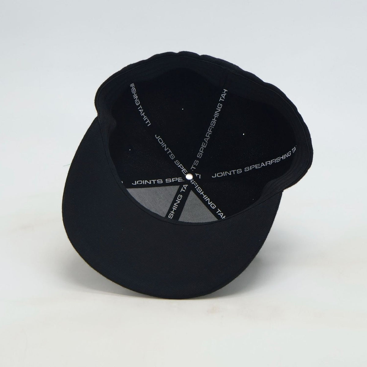 Close-up of the JOINTS Black Logo Performance Hat