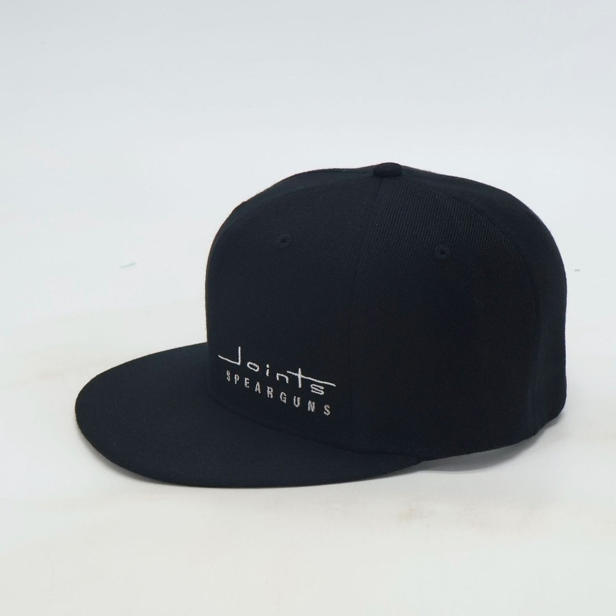 Side view of JOINTS Black Logo Performance Hat